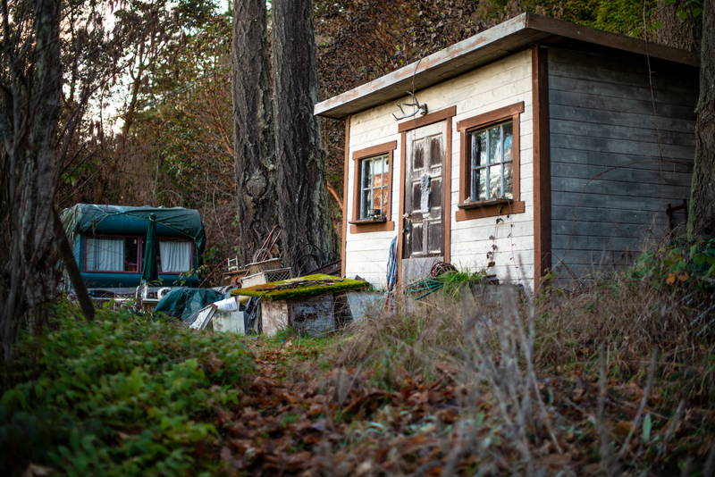 Tiny home, cabin in the woods on the Gulf Islands in rural British Columbia. Stock Photography Free for Commercial Use.