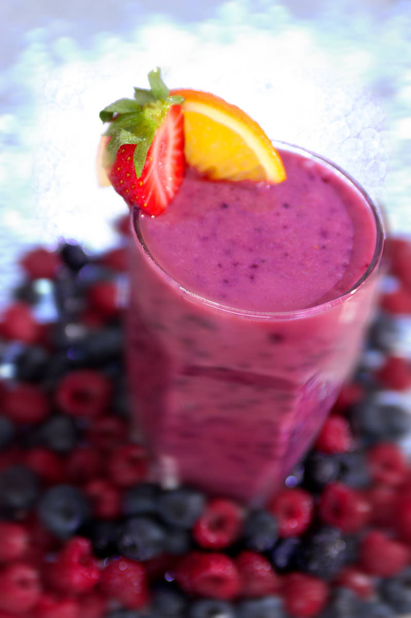 Vibrant berry smoothie, raspberry and blueberry. Stock Photography Free for Commercial Use.